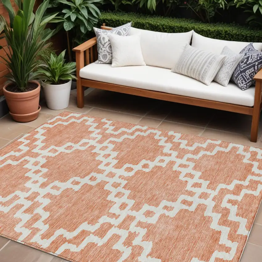 Salmon And Ivory Geometric Washable Indoor Outdoor Area Rug Photo 1