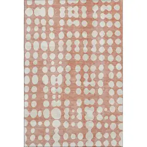 Photo of Salmon And Ivory Polka Dot Washable Area Rug With UV Protection