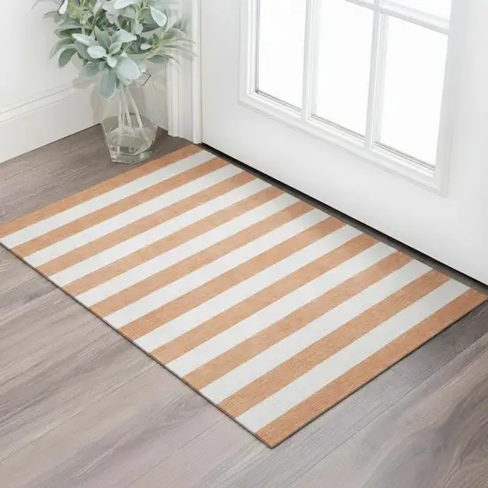 Salmon And Ivory Striped Washable Area Rug With UV Protection Photo 1
