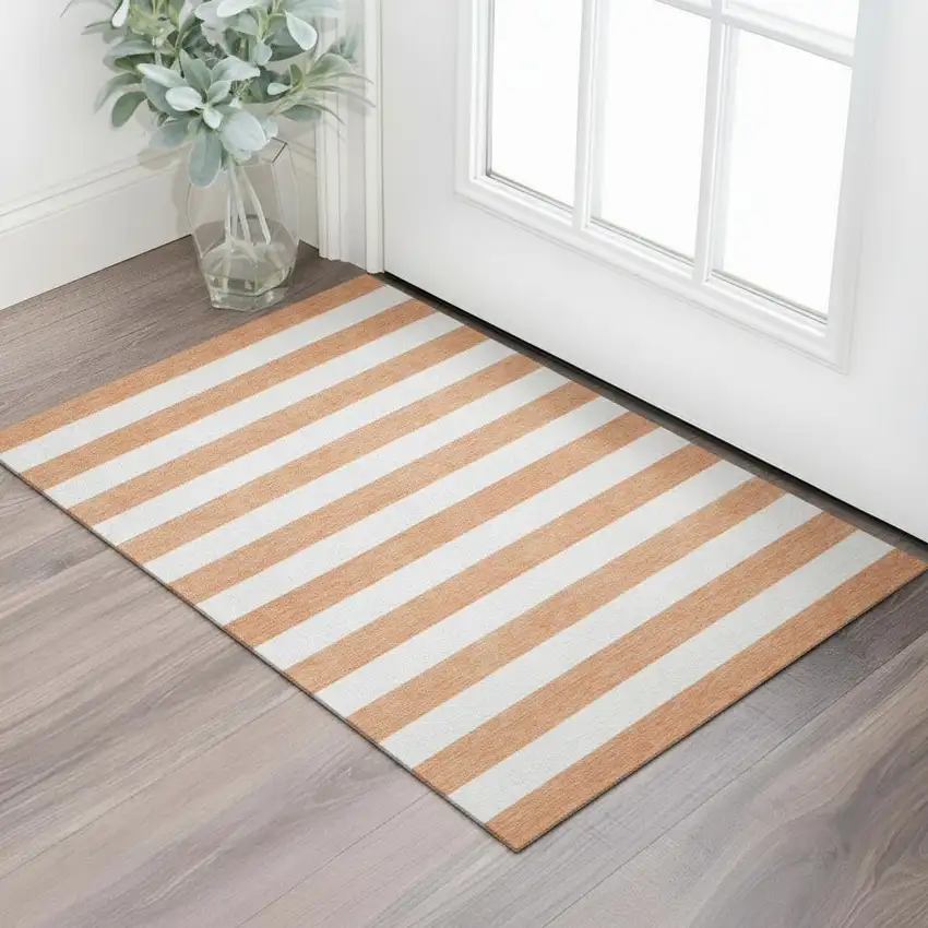 Salmon And Ivory Striped Washable Area Rug With UV Protection Photo 1