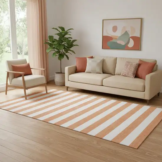 Salmon And Ivory Striped Washable Area Rug With UV Protection Photo 1