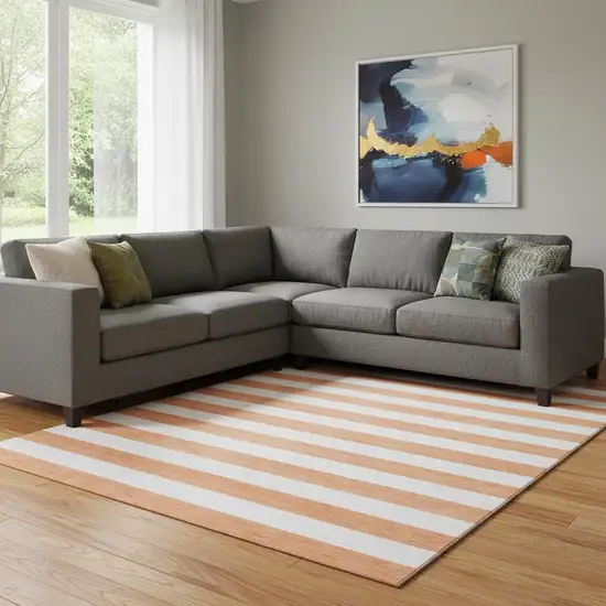 Salmon And Ivory Striped Washable Area Rug With UV Protection Photo 1