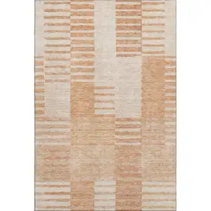 Photo of Salmon And Ivory Striped Washable Area Rug With UV Protection