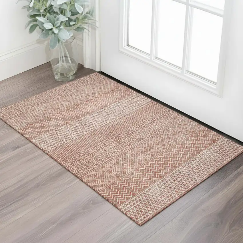 Salmon And Ivory Striped Washable Area Rug With UV Protection Photo 1