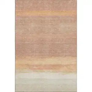 Photo of Salmon And Ivory Striped Washable Area Rug With UV Protection