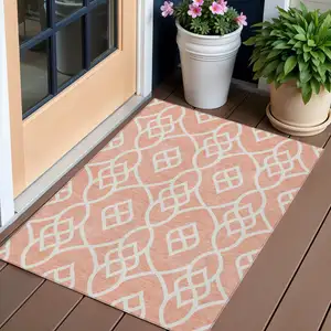 Photo of Salmon And Ivory Trellis Washable Indoor Outdoor Area Rug