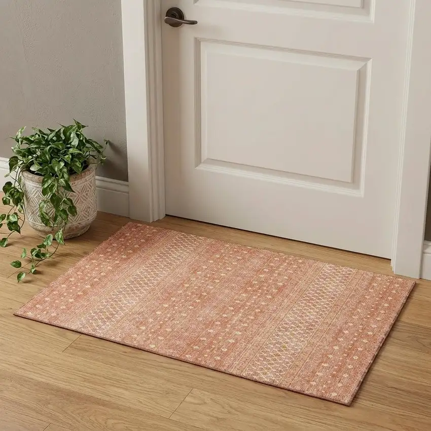 Salmon And Ivory Tribal Washable Area Rug With UV Protection Photo 1