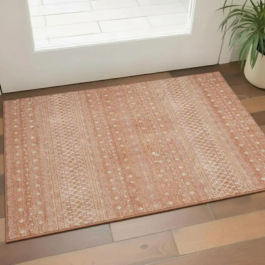 Salmon And Ivory Tribal Washable Area Rug With UV Protection Photo 1