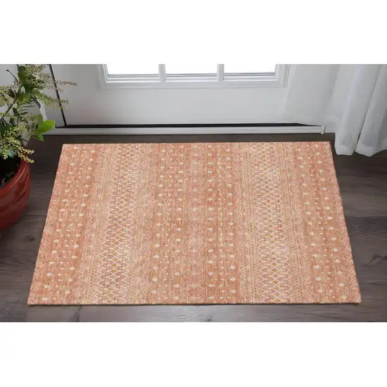 Salmon And Ivory Tribal Washable Area Rug With UV Protection Photo 3