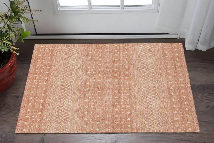 Salmon And Ivory Tribal Washable Area Rug With UV Protection Photo 3