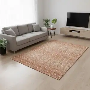 Photo of Salmon And Ivory Tribal Washable Area Rug With UV Protection