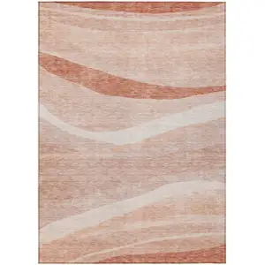 Photo of Salmon And Pink Abstract Washable Indoor Outdoor Area Rug