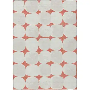 Photo of Salmon Beige And Ivory Abstract Washable Indoor Outdoor Area Rug