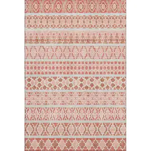 Photo of Salmon Beige And Ivory Ikat Washable Area Rug With UV Protection