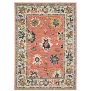 Photo of Salmon Blue And Yellow Oriental Area Rug With Fringe