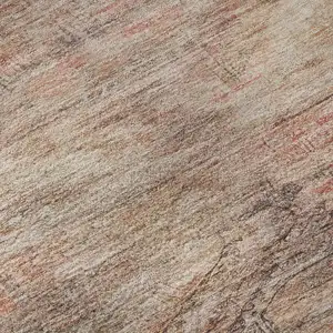 Photo of Salmon Copper And Beige Abstract Geometric Washable Area Rug With UV Protection