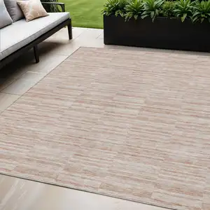 Photo of Salmon Copper And Beige Striped Washable Indoor Outdoor Area Rug