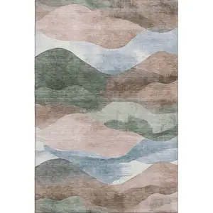 Photo of Salmon Emerald And Ivory Abstract Washable Area Rug With UV Protection