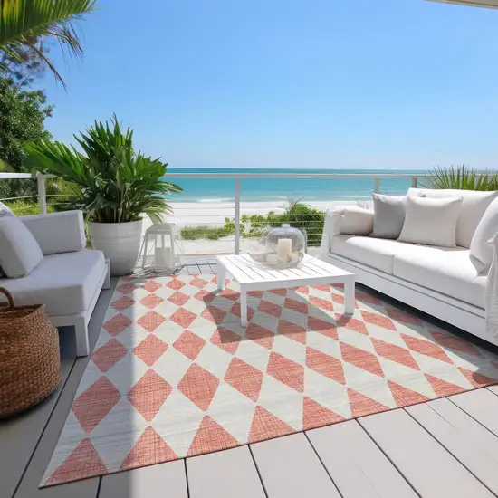 Salmon And Ivory Geometric Washable Indoor Outdoor Area Rug Photo 9