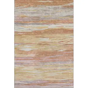 Photo of Salmon Gold And Gray Abstract Washable Area Rug With UV Protection
