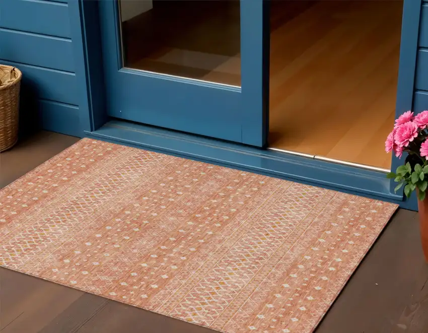 Salmon Gold And Ivory Tribal Washable Indoor Outdoor Area Rug Photo 1