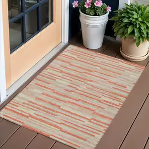 Photo of Salmon Gray And Beige Striped Washable Indoor Outdoor Area Rug