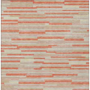 Photo of Salmon Gray And Beige Striped Washable Indoor Outdoor Area Rug