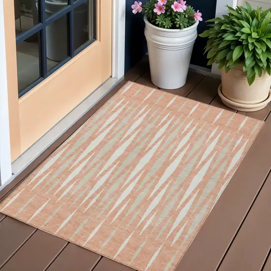 Salmon Gray And Ivory Geometric Washable Indoor Outdoor Area Rug Photo 1