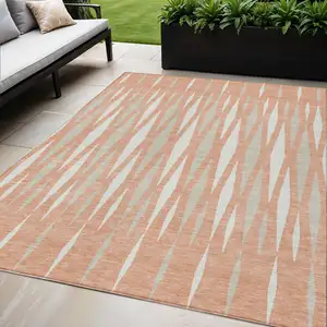Photo of Salmon Gray And Ivory Geometric Washable Indoor Outdoor Area Rug