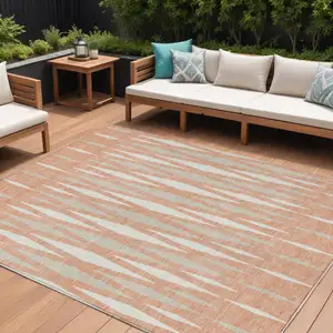 Photo of Salmon Gray And Ivory Geometric Washable Indoor Outdoor Area Rug