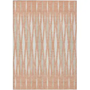 Photo of Salmon Gray And Ivory Geometric Washable Indoor Outdoor Area Rug