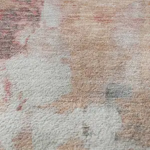 Photo of Salmon Ivory And Brown Abstract Washable Area Rug With UV Protection