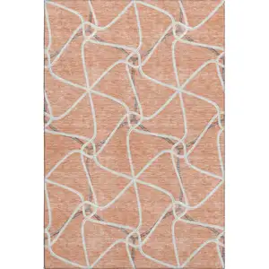 Photo of Salmon Ivory And Gray Geometric Washable Area Rug With UV Protection