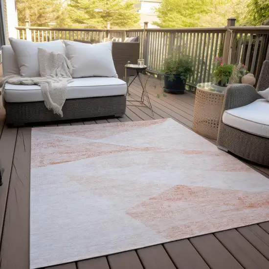 Salmon Peach And Ivory Abstract Washable Indoor Outdoor Area Rug Photo 7