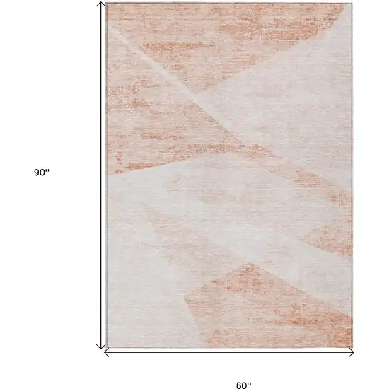 Salmon Peach And Ivory Abstract Washable Indoor Outdoor Area Rug Photo 3