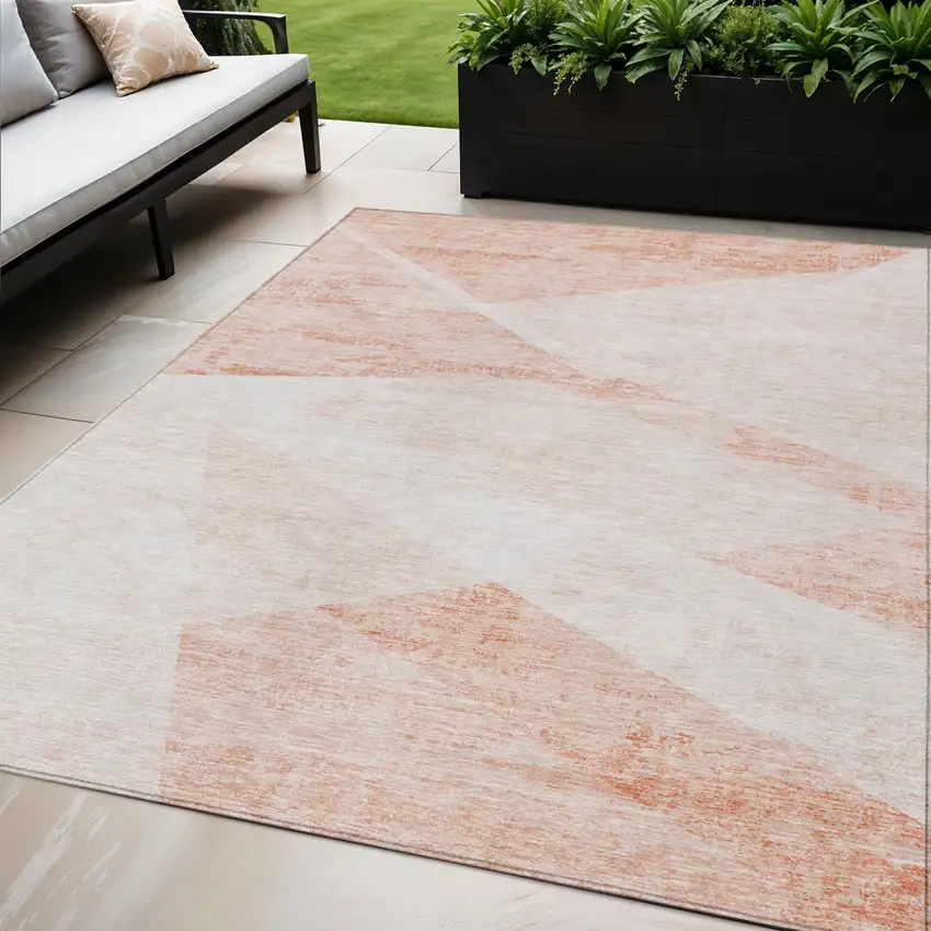 Salmon Peach And Ivory Abstract Washable Indoor Outdoor Area Rug Photo 1
