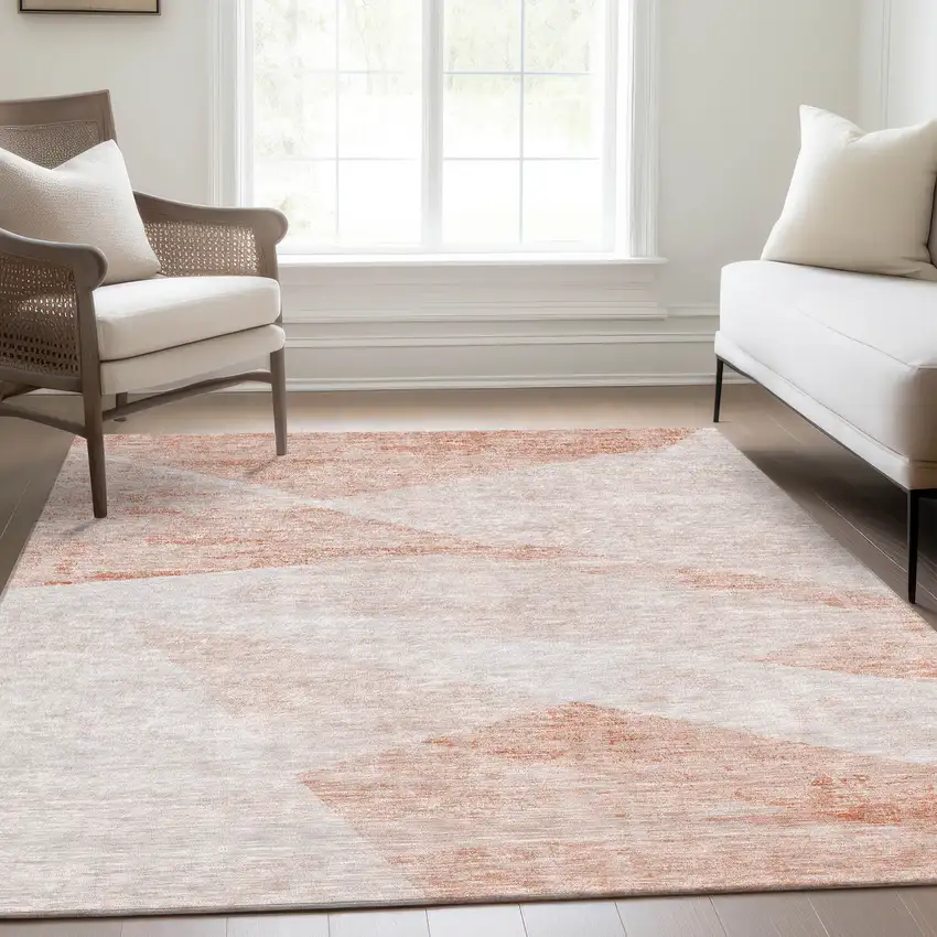 Salmon Peach And Ivory Abstract Washable Indoor Outdoor Area Rug Photo 9