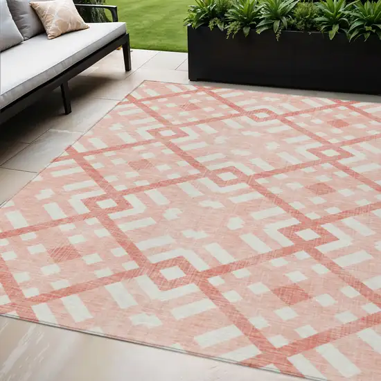 Salmon Peach And Ivory Geometric Washable Indoor Outdoor Area Rug Photo 1