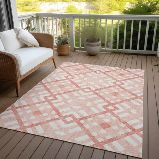 Salmon Peach And Ivory Geometric Washable Indoor Outdoor Area Rug Photo 7