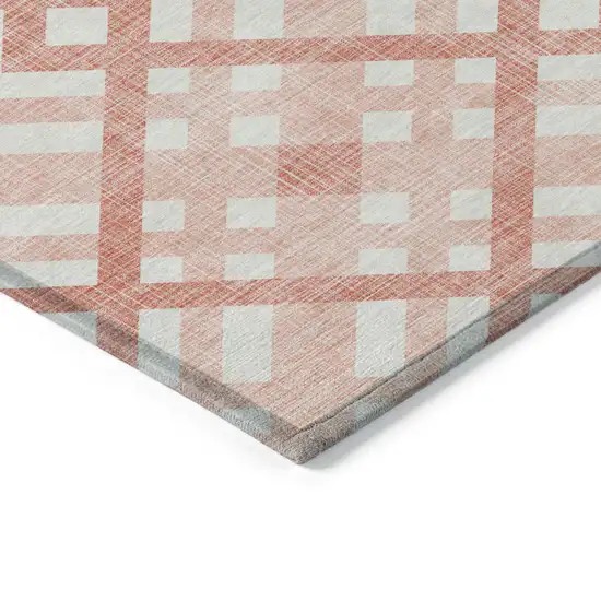 Salmon Peach And Ivory Geometric Washable Indoor Outdoor Area Rug Photo 4