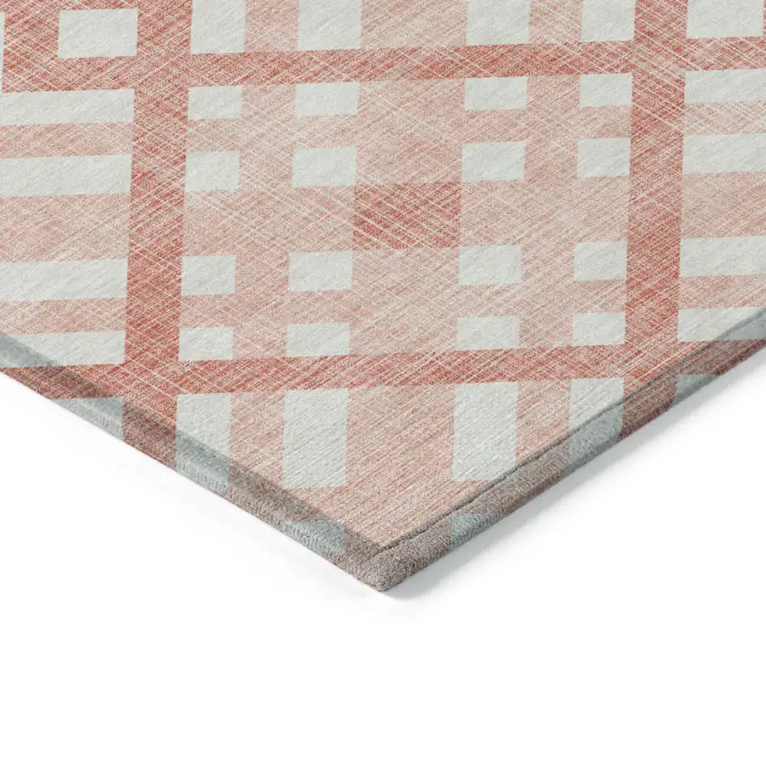 Salmon Peach And Ivory Geometric Washable Indoor Outdoor Area Rug Photo 4
