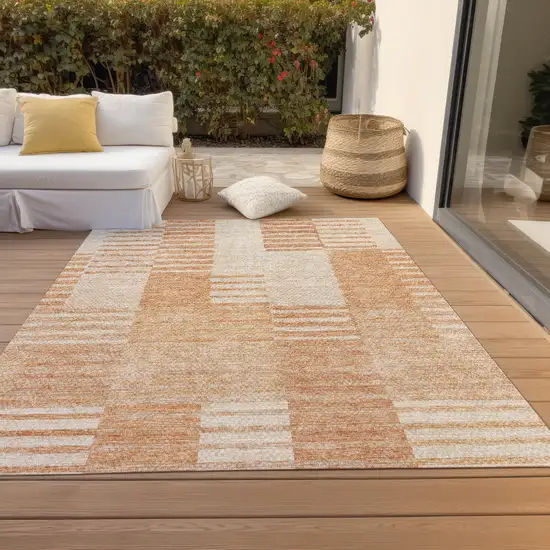 Salmon Peach And Ivory Striped Washable Indoor Outdoor Area Rug Photo 7