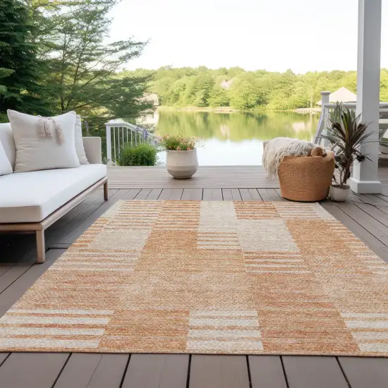Salmon Peach And Ivory Striped Washable Indoor Outdoor Area Rug Photo 9