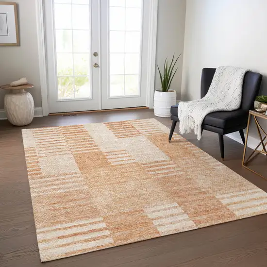 Salmon Peach And Ivory Striped Washable Indoor Outdoor Area Rug Photo 7