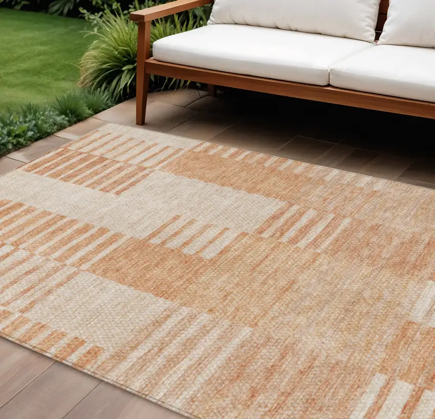 Salmon Peach And Ivory Striped Washable Indoor Outdoor Area Rug Photo 1