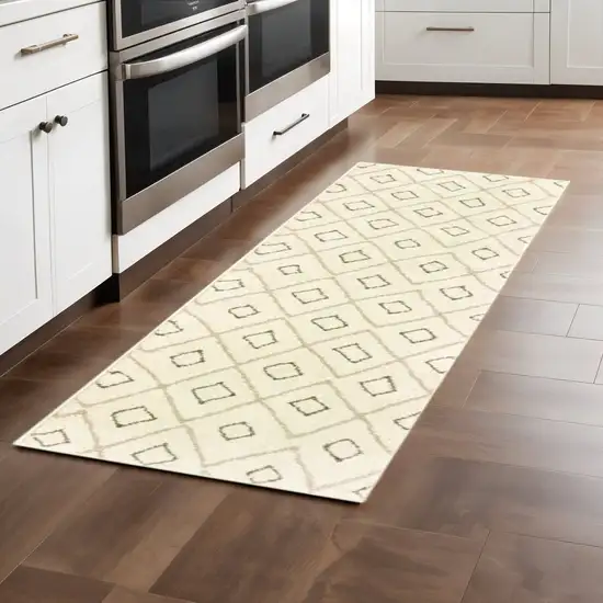 2' X 8' Sand Ash Grey And Ivory Geometric Power Loom Stain Resistant Runner Rug Photo 1