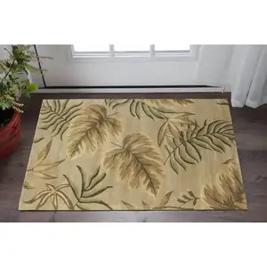 Photo of Sand Beige Hand Tufted Tropical Leaves Indoor Area Rug