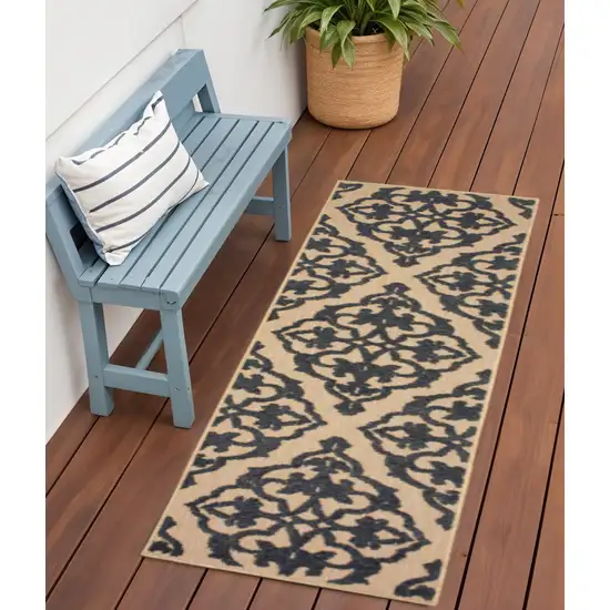 Beige and Black Oriental Stain Resistant Indoor Outdoor Area Rug Photo 1