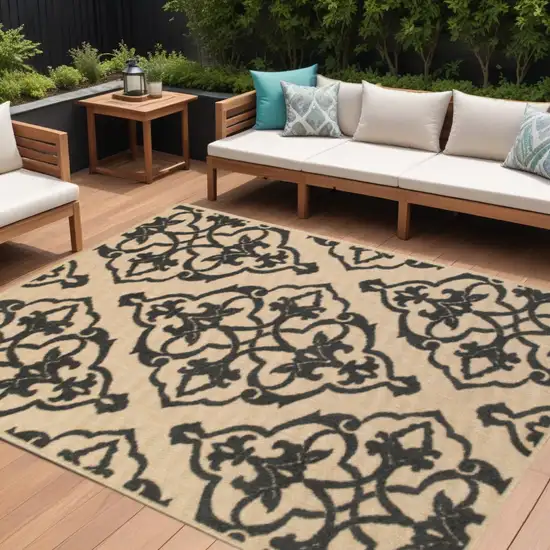 Beige and Black Oriental Stain Resistant Indoor Outdoor Area Rug Photo 1
