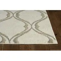 Photo of Sand Wavy Line Pattern Accent Rug